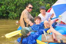 Playing in river during Serendipity float trip